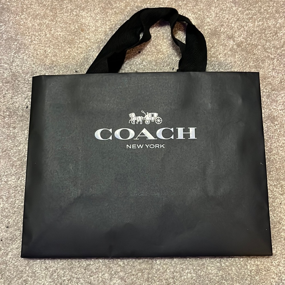 Small coach paper shopping bag